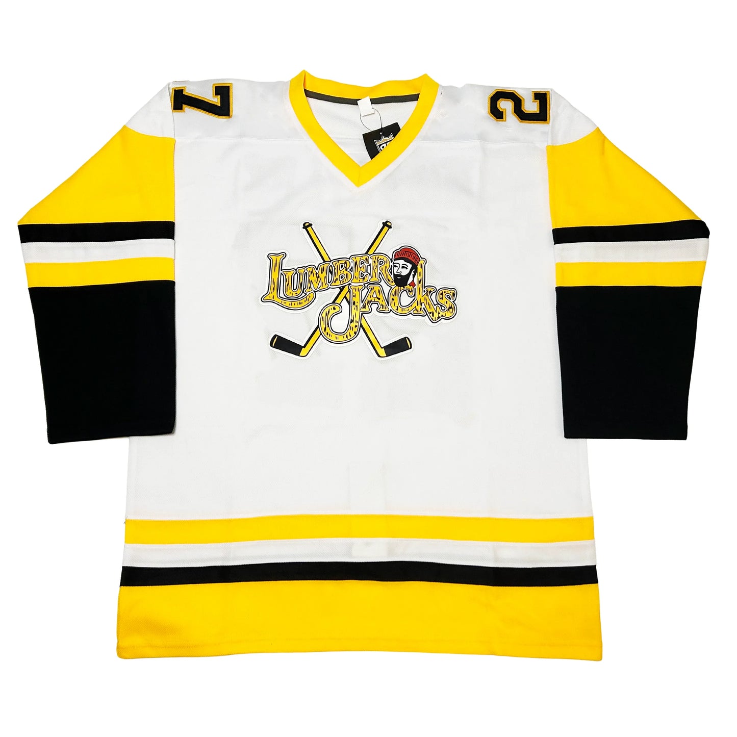 Cleveland Lumberjacks Jersey original 1995 jersey white. Gold upper sleeves with black, white, and gol bands mid-sleeve, black below. Gold white, black, and gold band at waist. #72 in black with gold trim on shoulders, Gold trim on neck. Lumberjacks logo consisting of Lumberjacks stylized in gold with black trim over two gold hockey sticks with black trim. Lumberjack face with red hat just above Jacks in Lumberjacks. Royal Retros