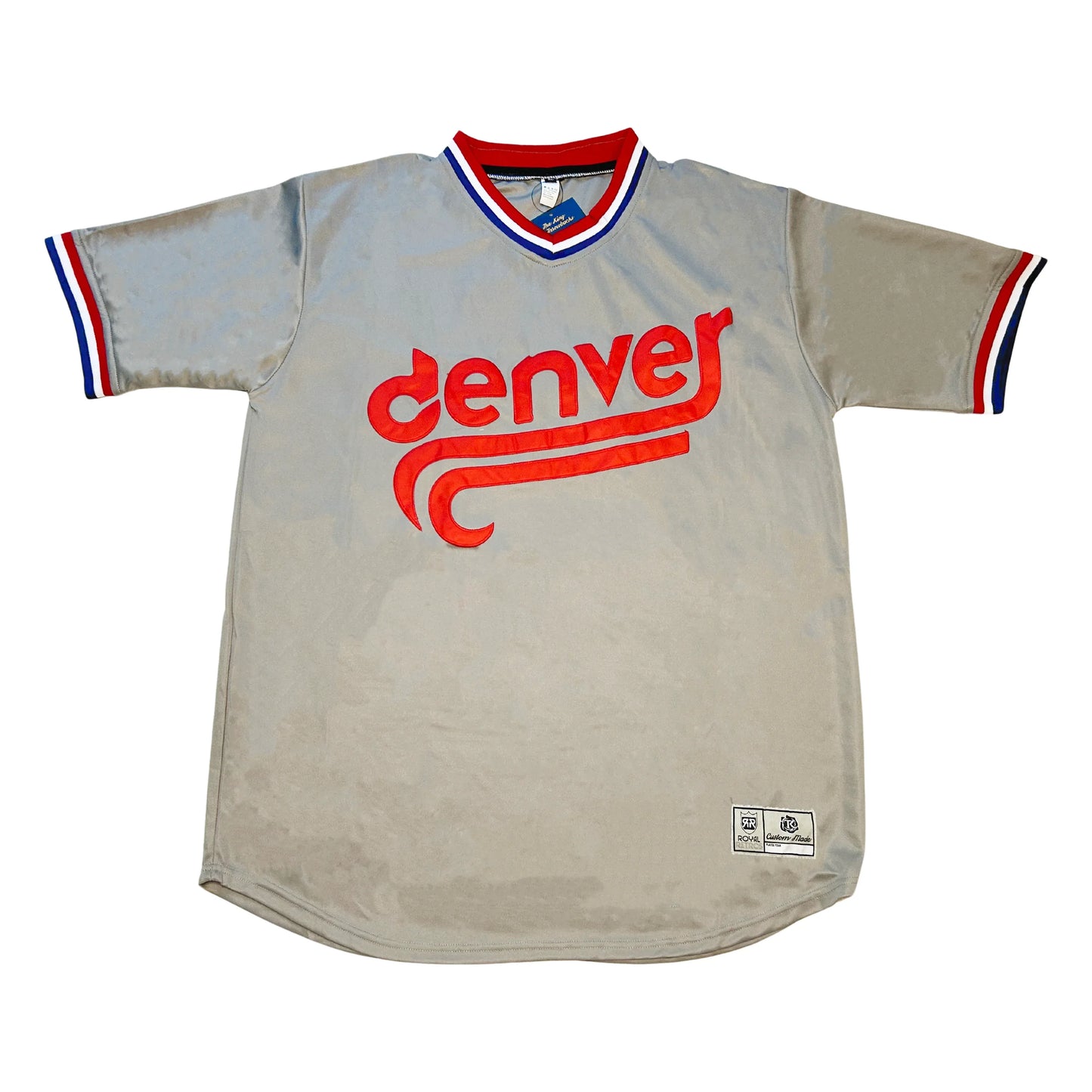 Denver Bears gray baseball jersey. Red, white, and blue collar and sleeve ends. Stylized denver in lower case in red with sweeping double tail underneath.