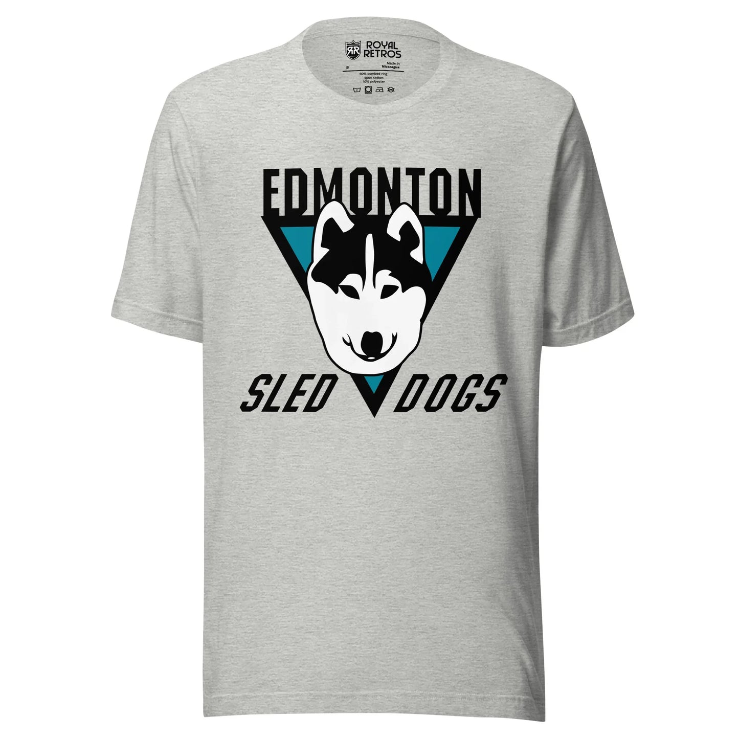Edmonton Sled Dogs roller hockey T-Shirt. Light Gray. Black upside-down triangle. Husky face over top. Edmonton in black above triangle. Sled and Dogs on either side of bottom of triangle. Royal Retros