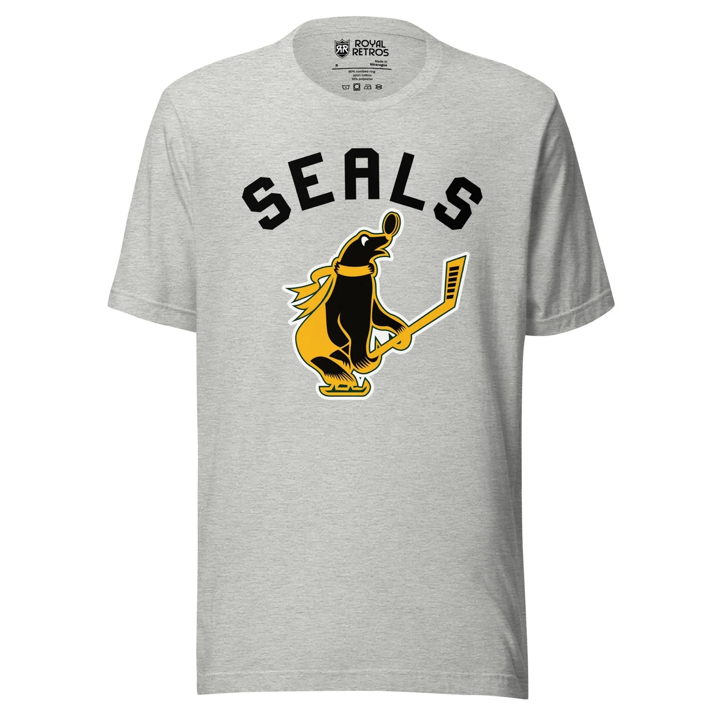 San Francisco Seals hockey T-shirt gray. Seals in black, large arched above Seal with gold scarf carrying a hockey stick and facing right. Royal Retros