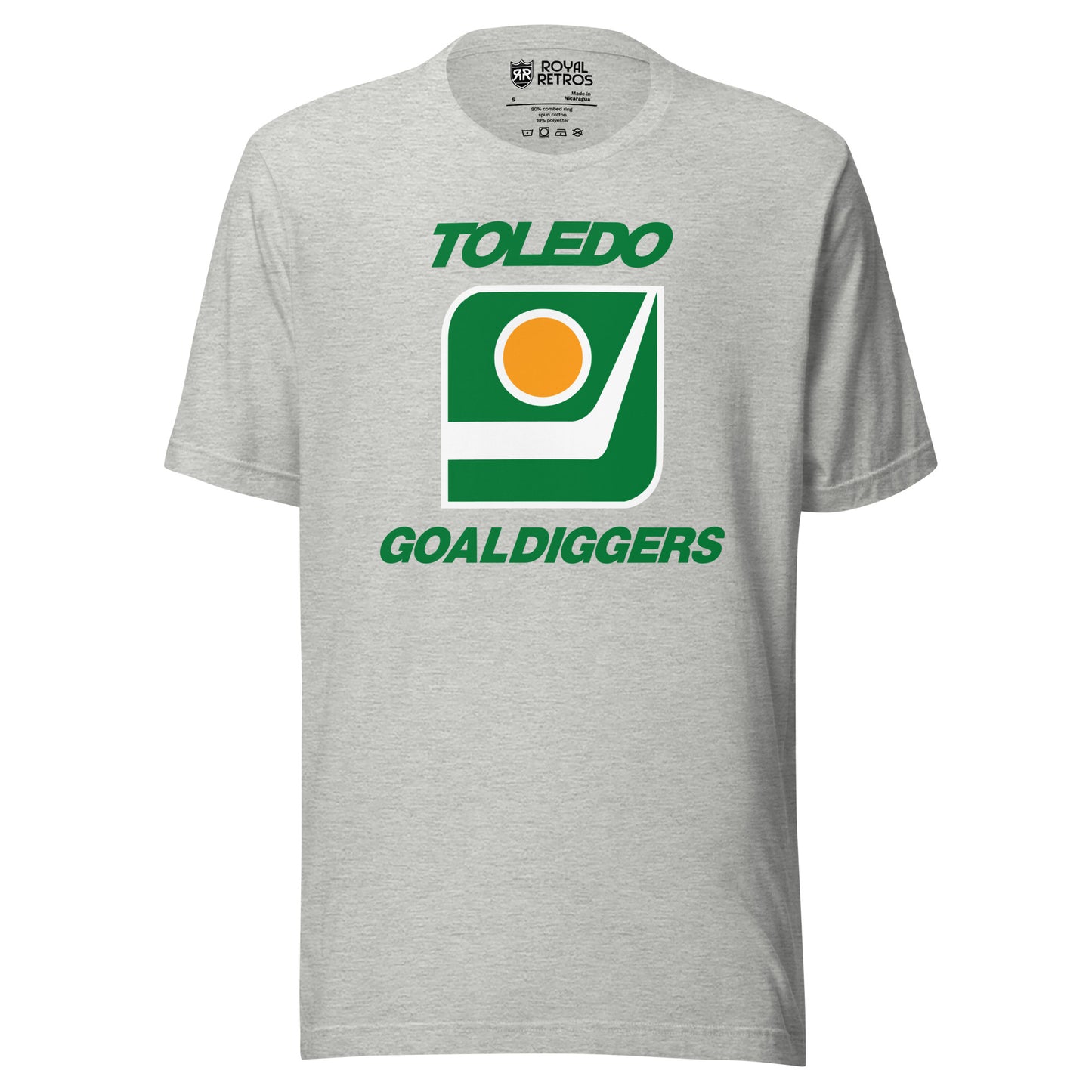 Toledo Goaldiggers hockey T-shirt. Grey. Toledo in green above white outlined square with green background. Inside is a hockey blade with a gold puck with white trim above. Goaldiggers in green below. square. Royal Retros