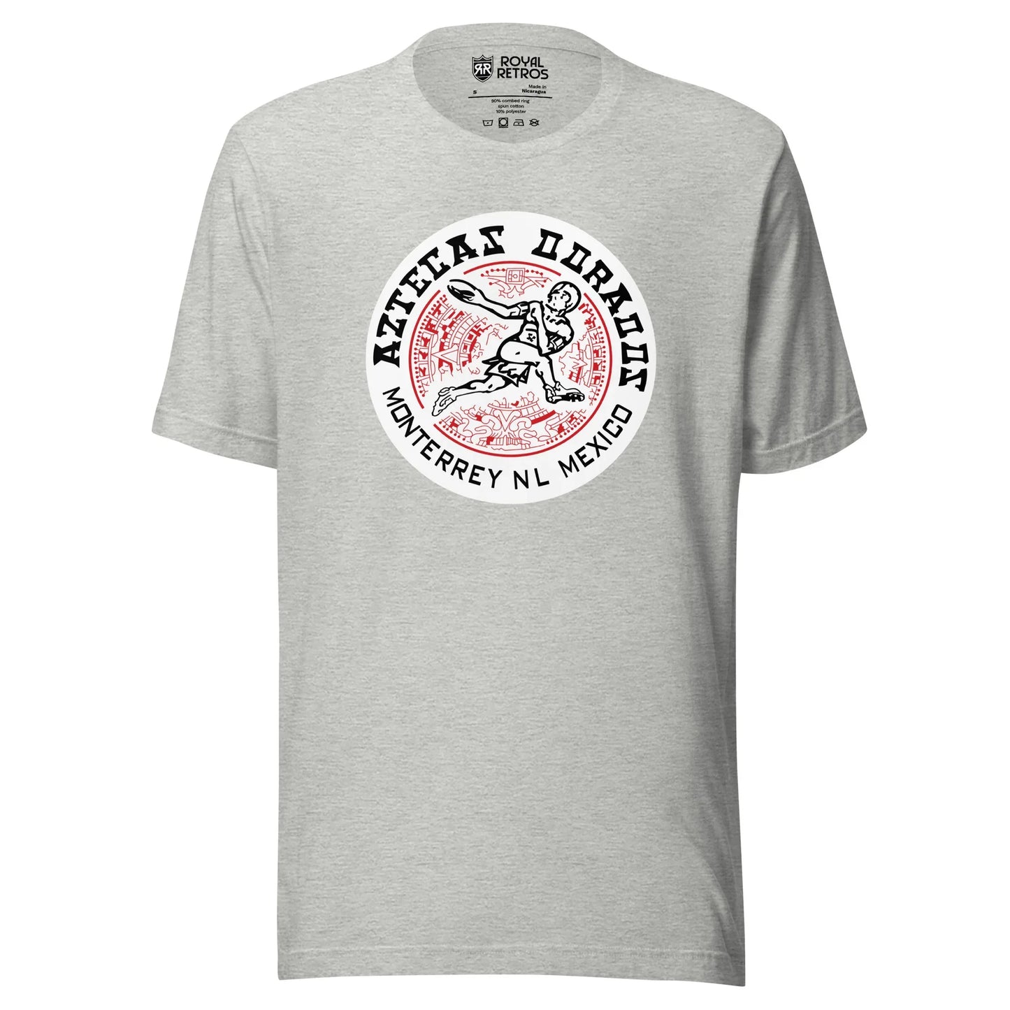 Mexico Aztecas football T-shirt heather gray. White circle with Aztecas Dorados curved above inside, Monterrey NL Mexico curved below in circle. Center his a line drawing of a football player running over Aztec shield with red detail. Royal Retros