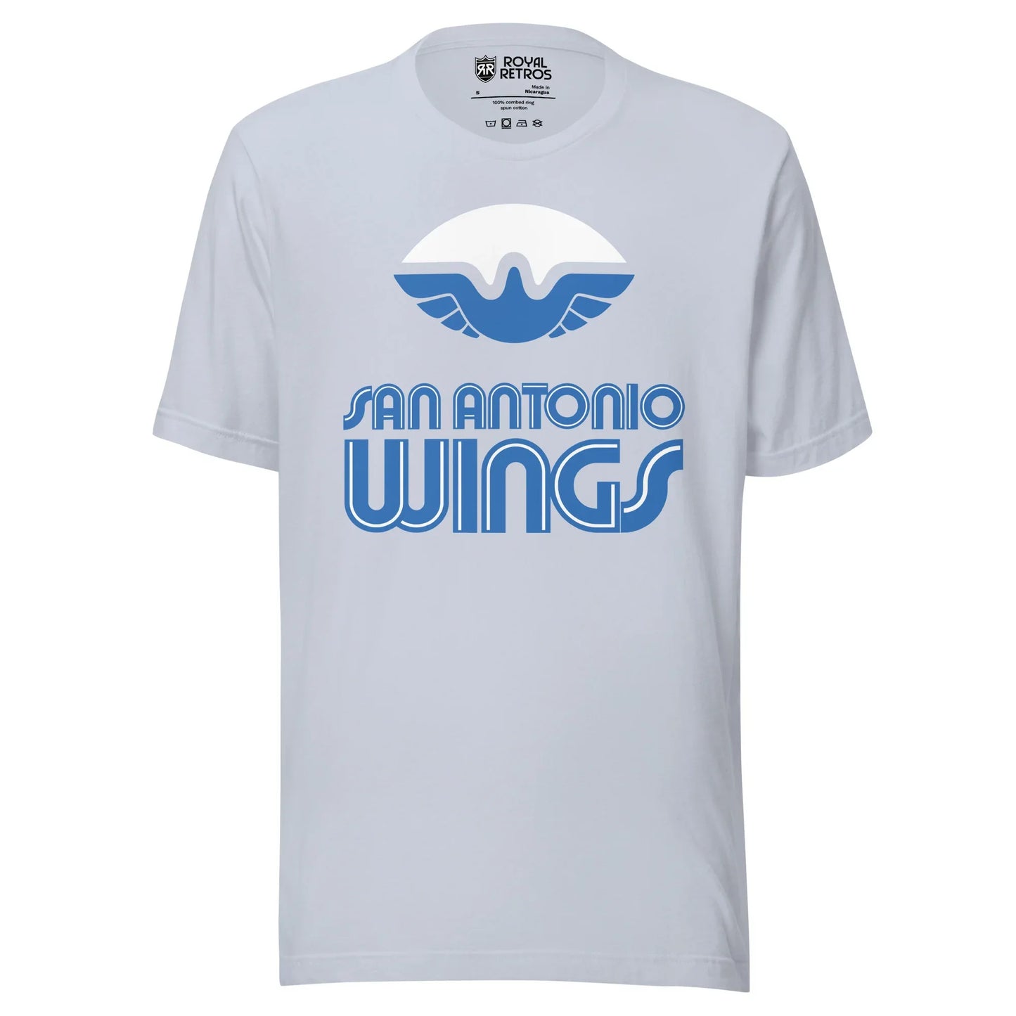 San Antonio Wings World Football League WFL T-shirt. Light Blue. White football with stylized bird with wings in blue filling in the bottom of the ball. San Antonio in blue with white trim above larger WINGS. Royal Retros