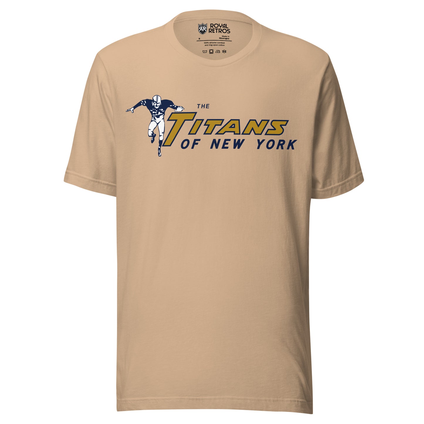 New York Titans T-shirt. American Football League. Tan. Football player to the left, arms outstretched , running toward viewer. TITANS to right in gold, with large T. Of New York below in blue. Royal Retros.