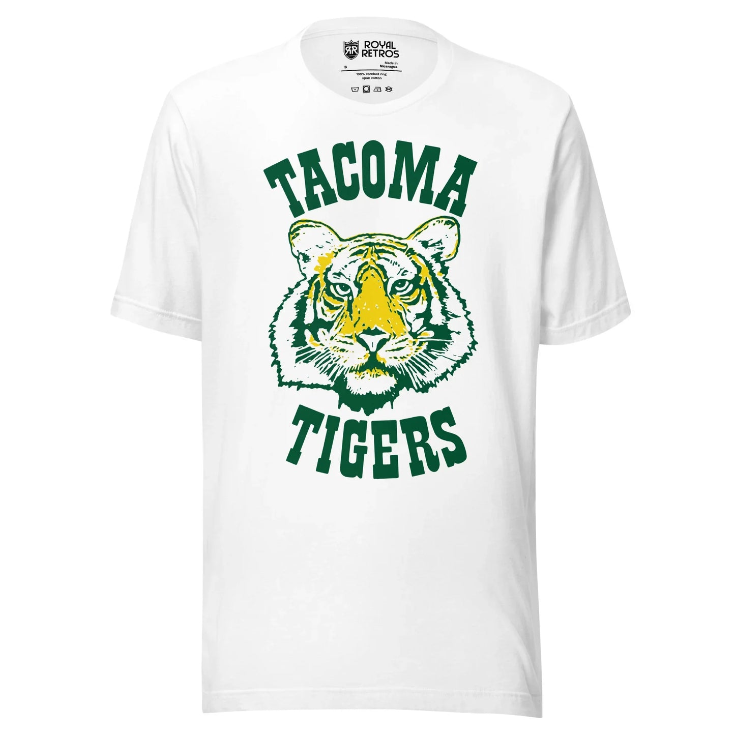 Tacoma Tigers baseball T-shirt. White. Tacoma arched above in bold Rockwell typeface green. Tiger face in middle, yellow, green and white. Tigers arched up below in bold Rockwell typeface green. Royal Retros