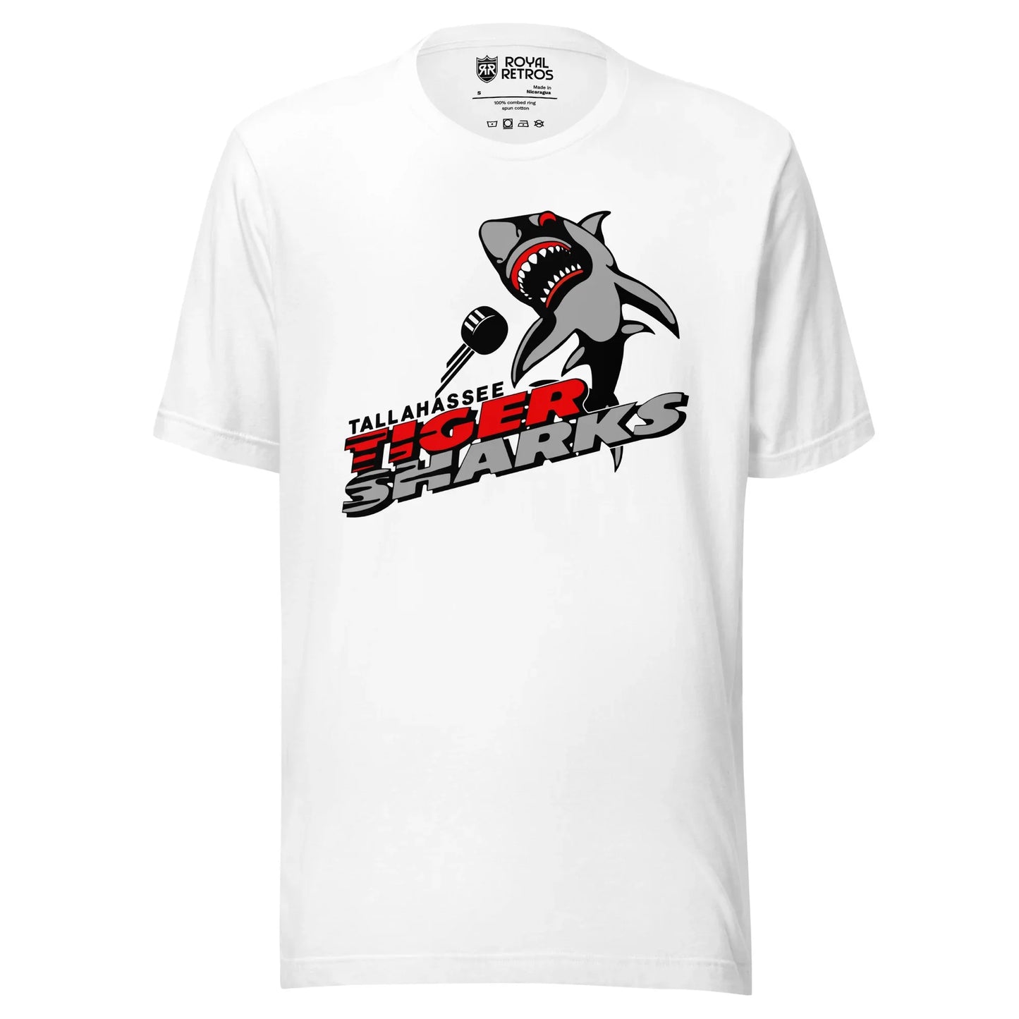 Tallahassee Tiger Sharks hockey T-shirt. White. Logo is a shark swimming toward viewer with Tallahassee small in black with white trim above Tiger in red and Sharks in silver. Royal Retros