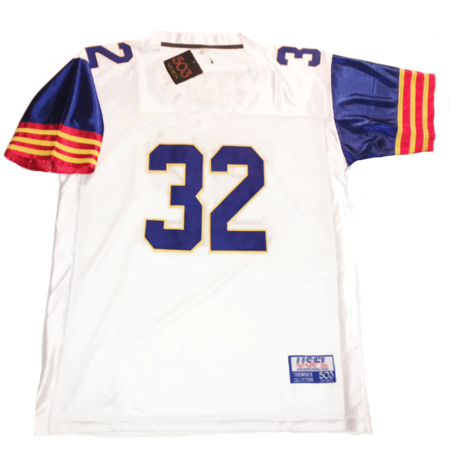 1983 Arizona Wranglers USFL Jersey white with blue shoulders. 6 alternating res and gold bands at sleeve ends. #32 large on chest, small on sleeves. Royal Retros