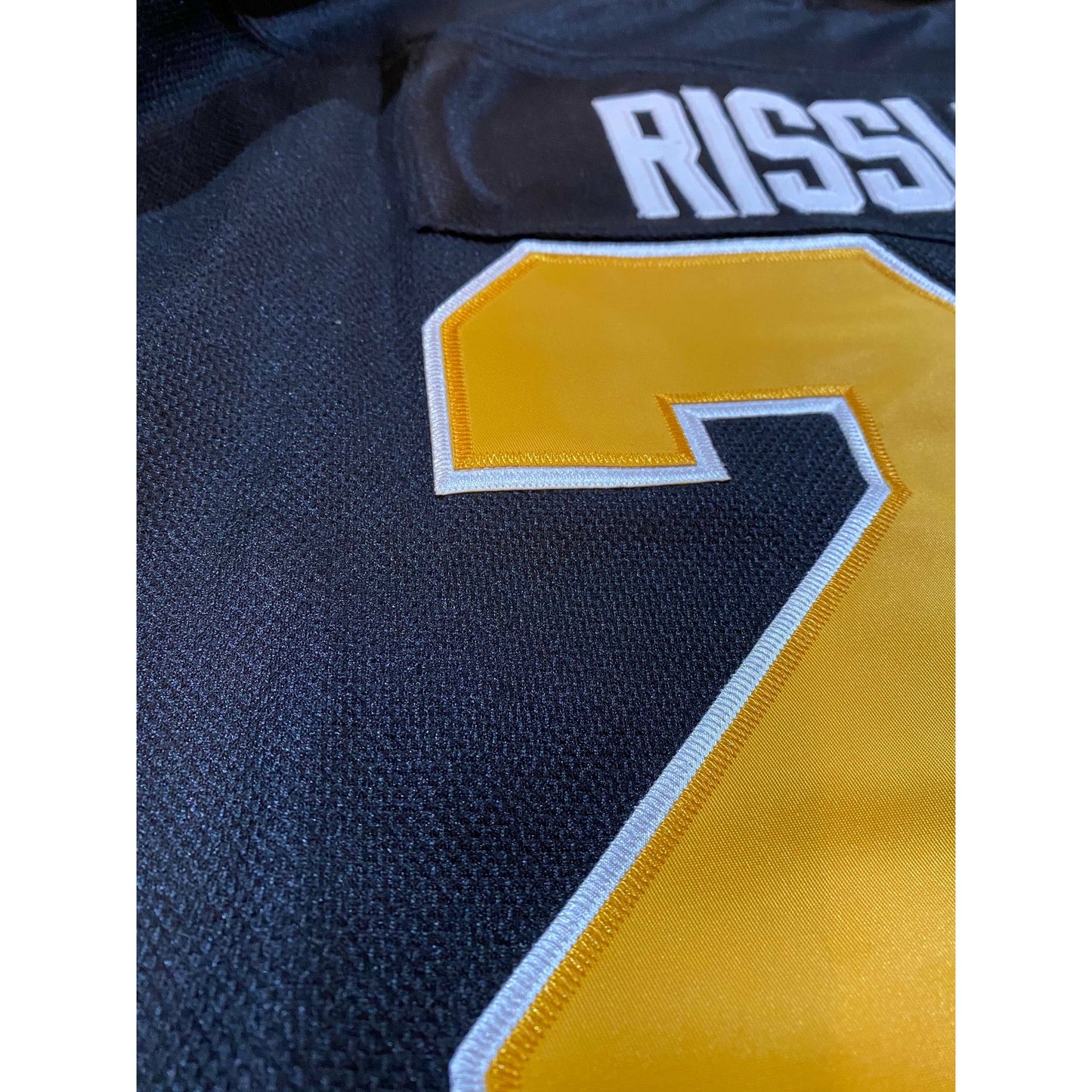 Baltimore Skipjacks black close-up #2 gold with white trim. Royal Retros