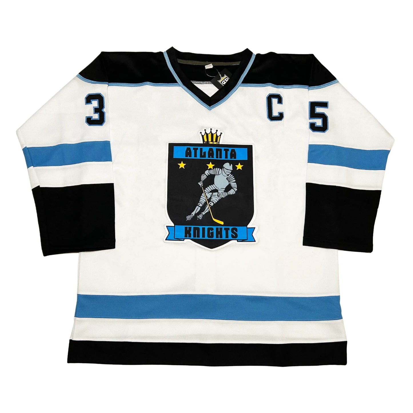 Atlanta Knights Jersey white. Black rim on shoulders, Blue, white, and black bands on lower sleeves and waist. Knights logo, black, with silver skating knight. Atlanta in black on blue banner above, Knights on blue banner below. #35 in black with blue trim on shoulders. Royal Retros