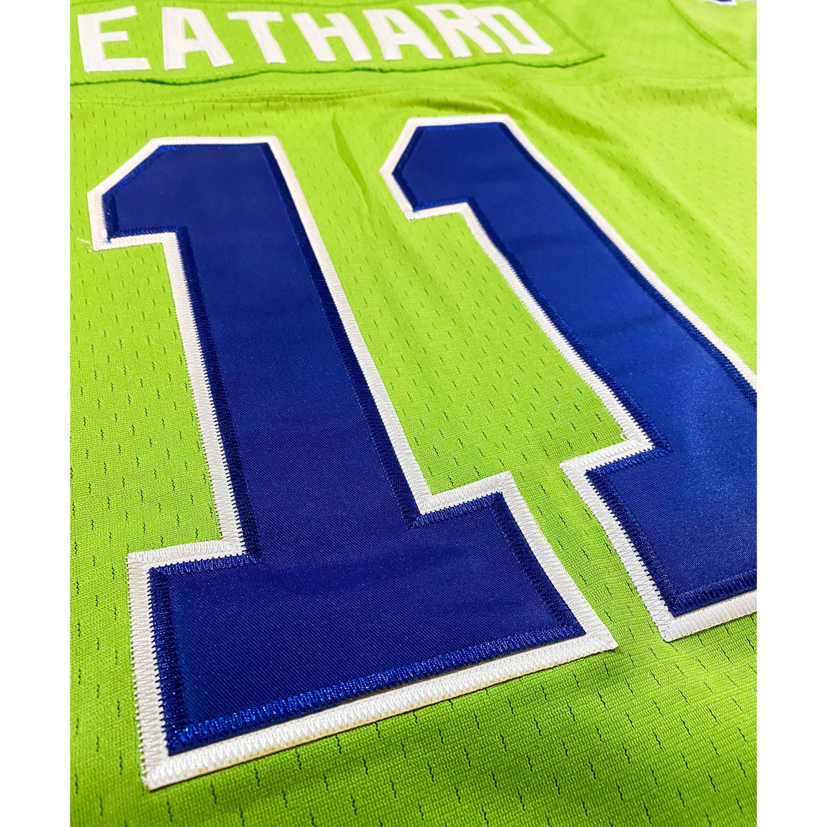Portland Storm Beathard jersey green close-up white lettering with blue #11 Royal Retros