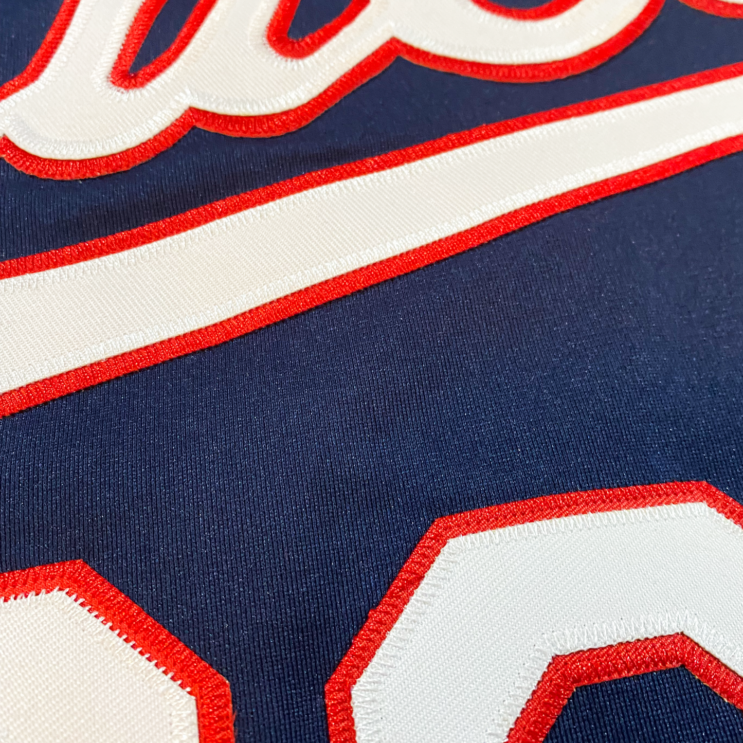 Detailed view of the New Orleans Buccaneers Jersey featuring Royal Retros design