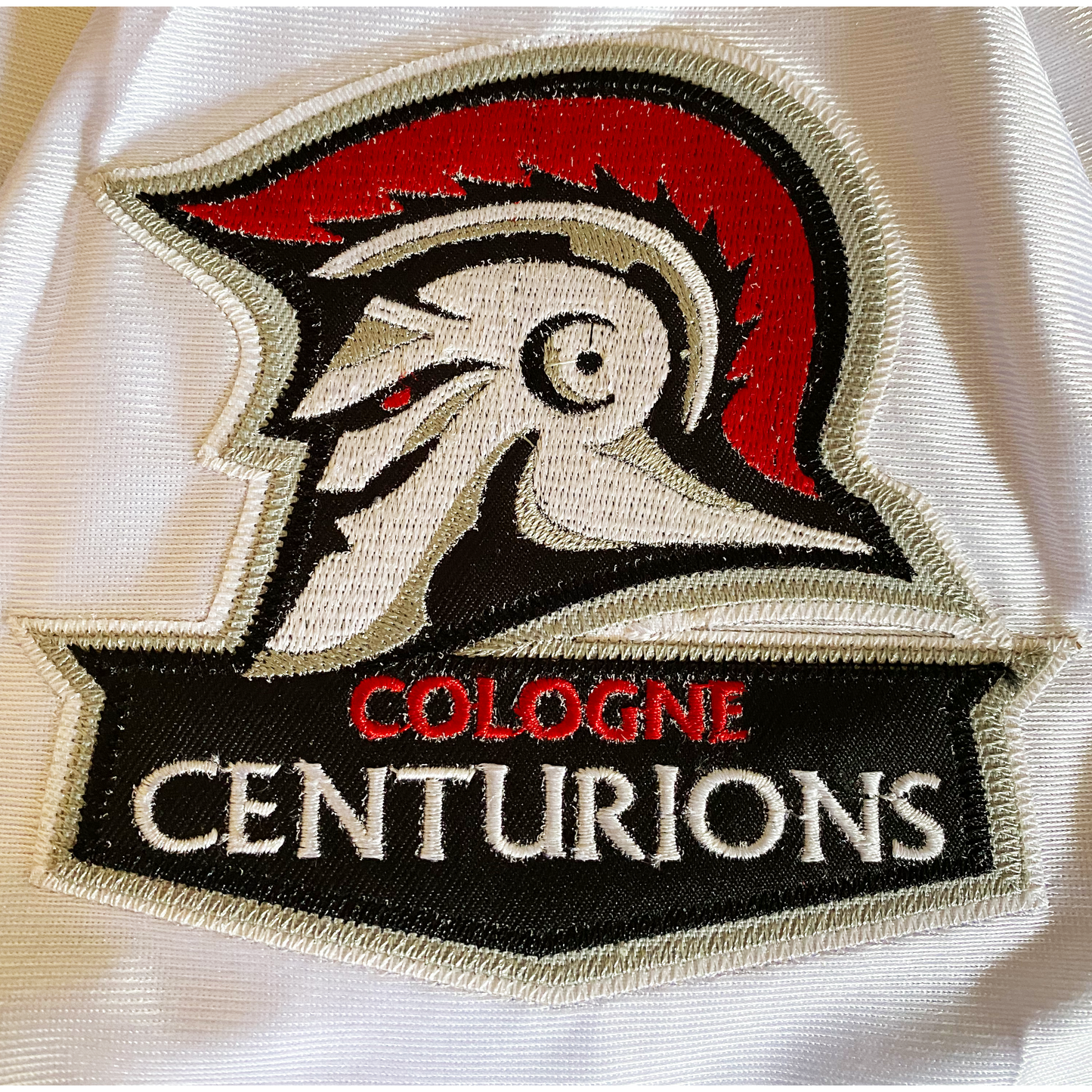 Cologne Centurions Jersey white close-up logo Royal Retros