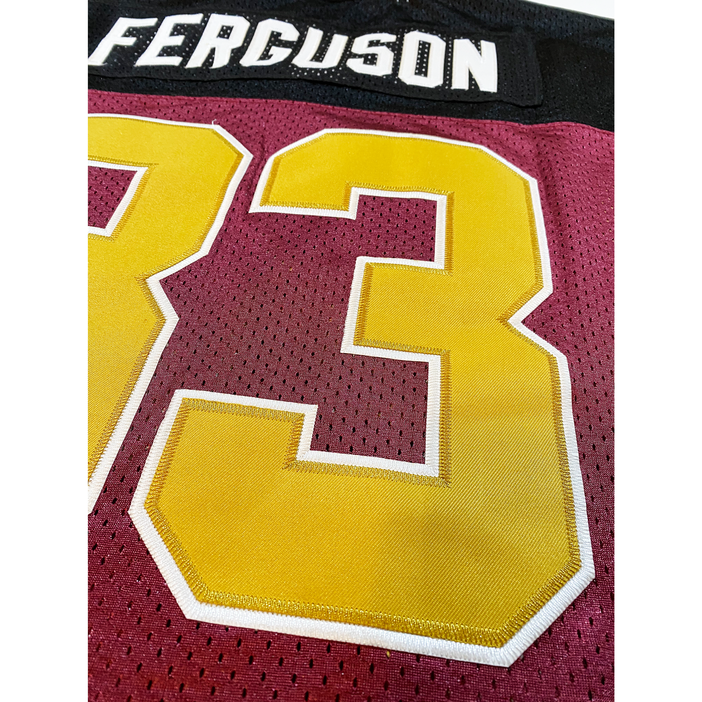 Rhein Fire WLAF Jersey close-up maroon jersey with gold #33 Royal Retros