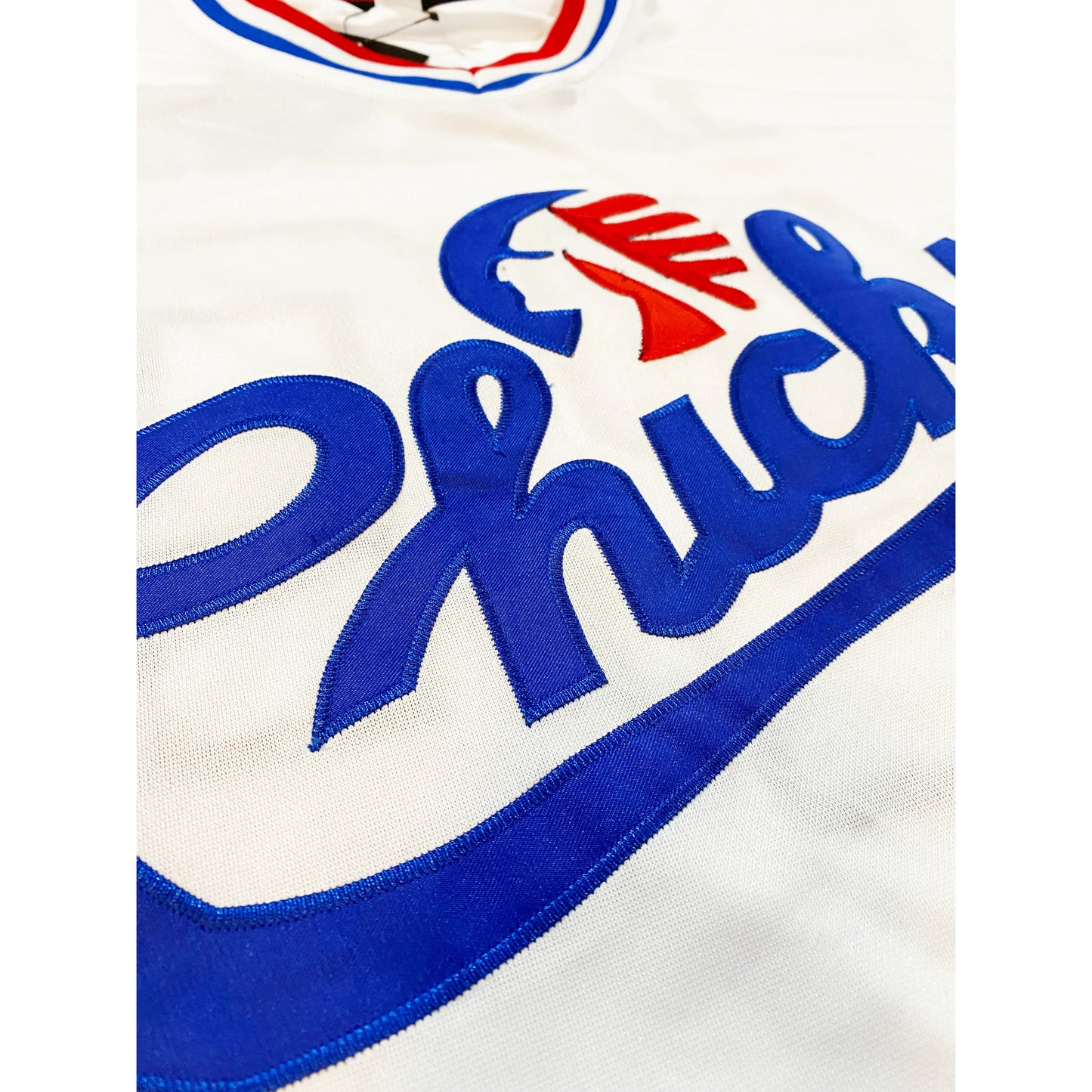 White Memphis Chicks Jersey with blue lettering and a red logo, inspired by Tim McCarver