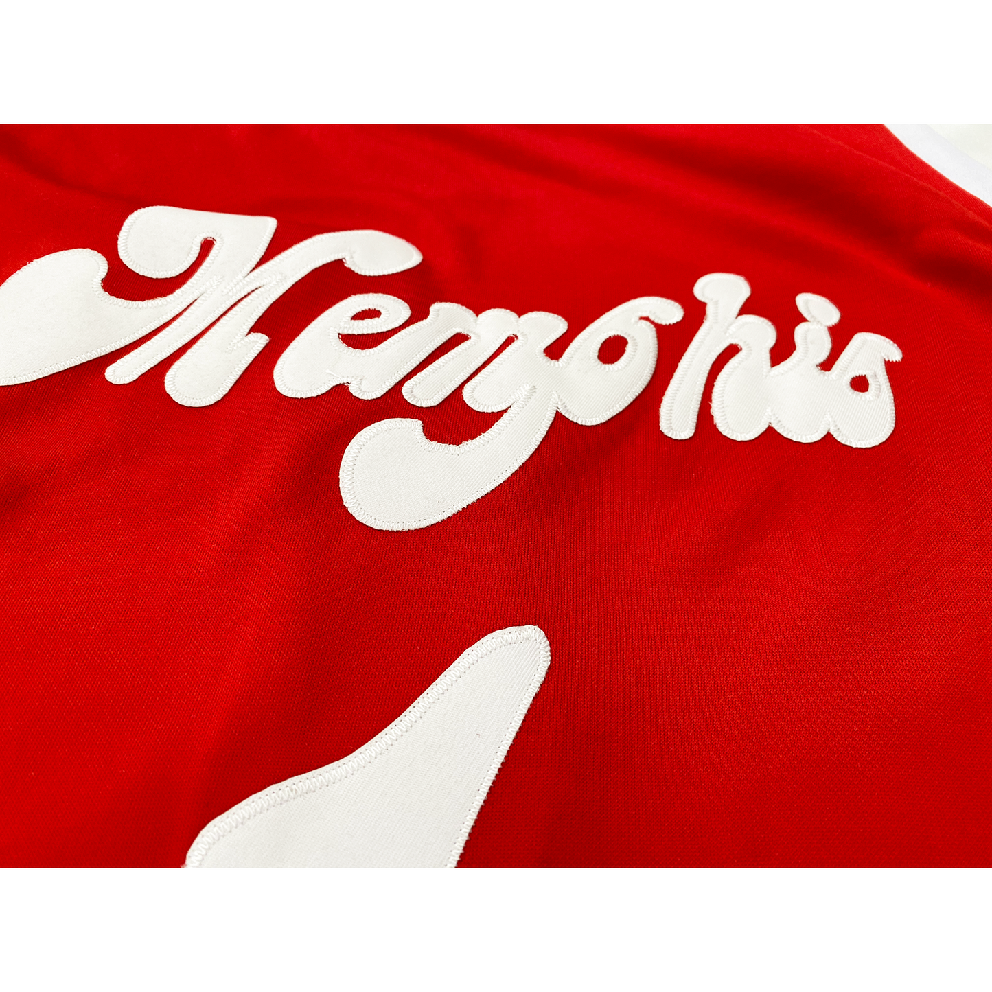Red fabric Memphis Sounds Jersey featuring bold white lettering for stylish fans