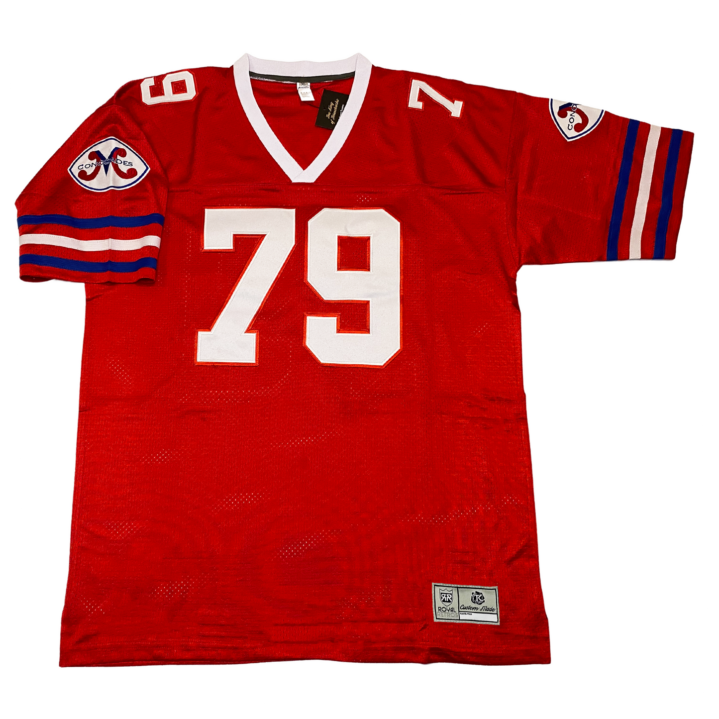 Montreal Concordes Jersey red. White collar. Blue, white, and red thin stripes on sleeve ends. White #79 large on chest, small on shoulders, Concordes logo on shoulders, consisting of stylized red M in white oval with white border. CONCORDES across M. Royal Retros