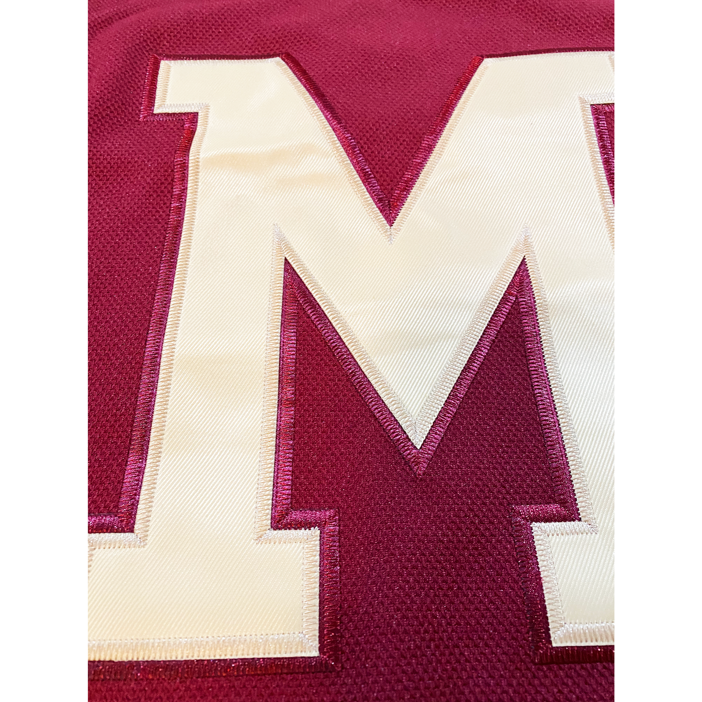 Maroon fabric Montreal Maroons Jersey featuring a white letter M for vintage hockey fans