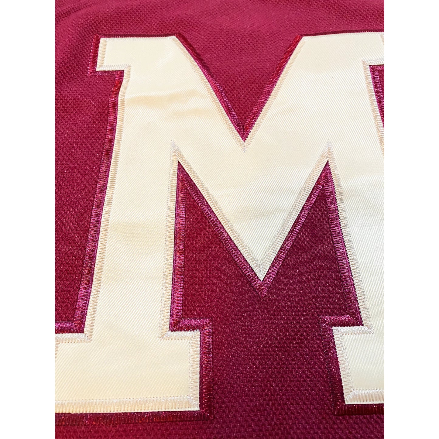 Maroon fabric Montreal Maroons Jersey featuring a white letter M for vintage hockey fans