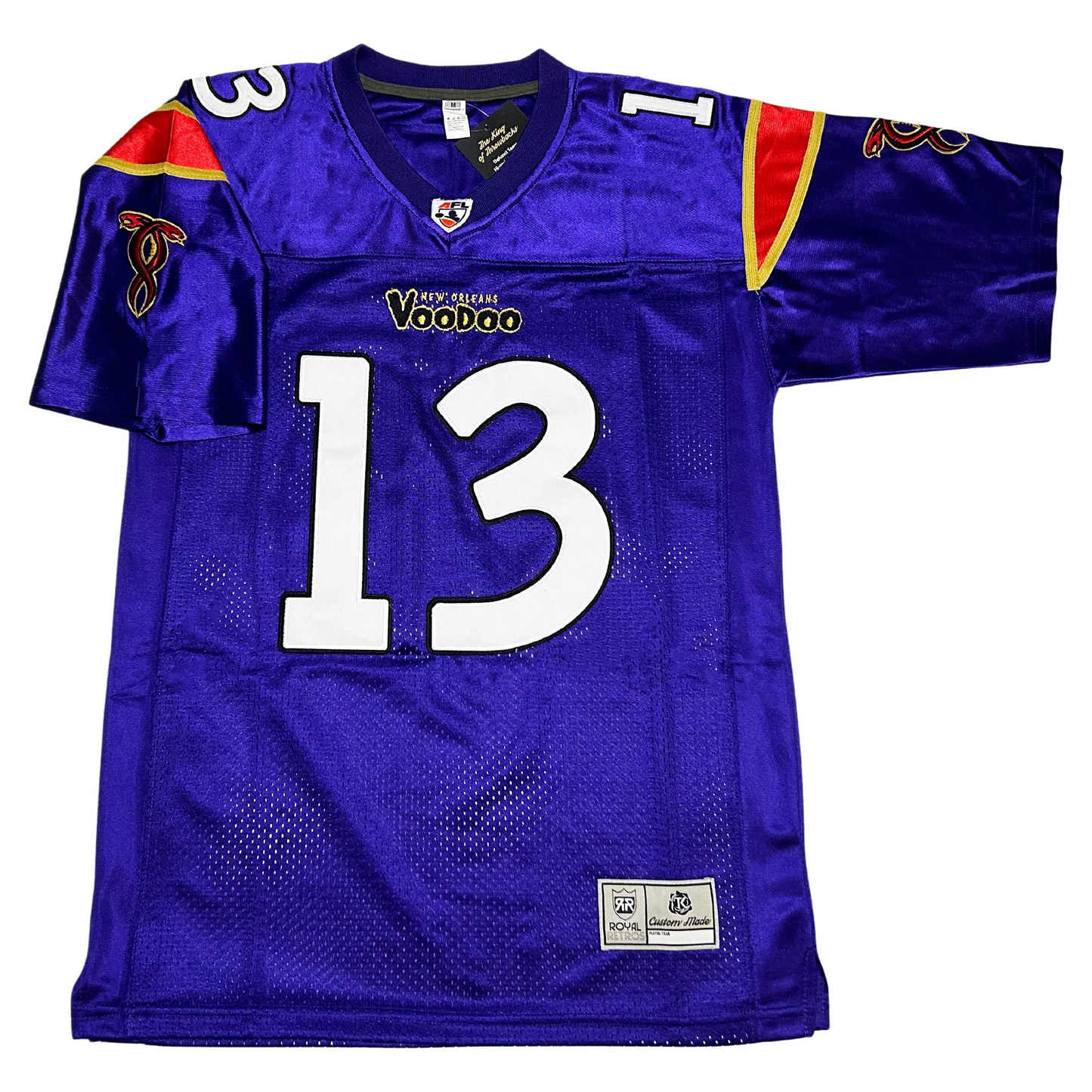 New Orleans Voodoo Arena Football League jersey purple. Red and gold trim on shoulders. #13 in white large on chest, small on shoulders. Stylized New Orleans VooDoo mall above number. Royal Retros