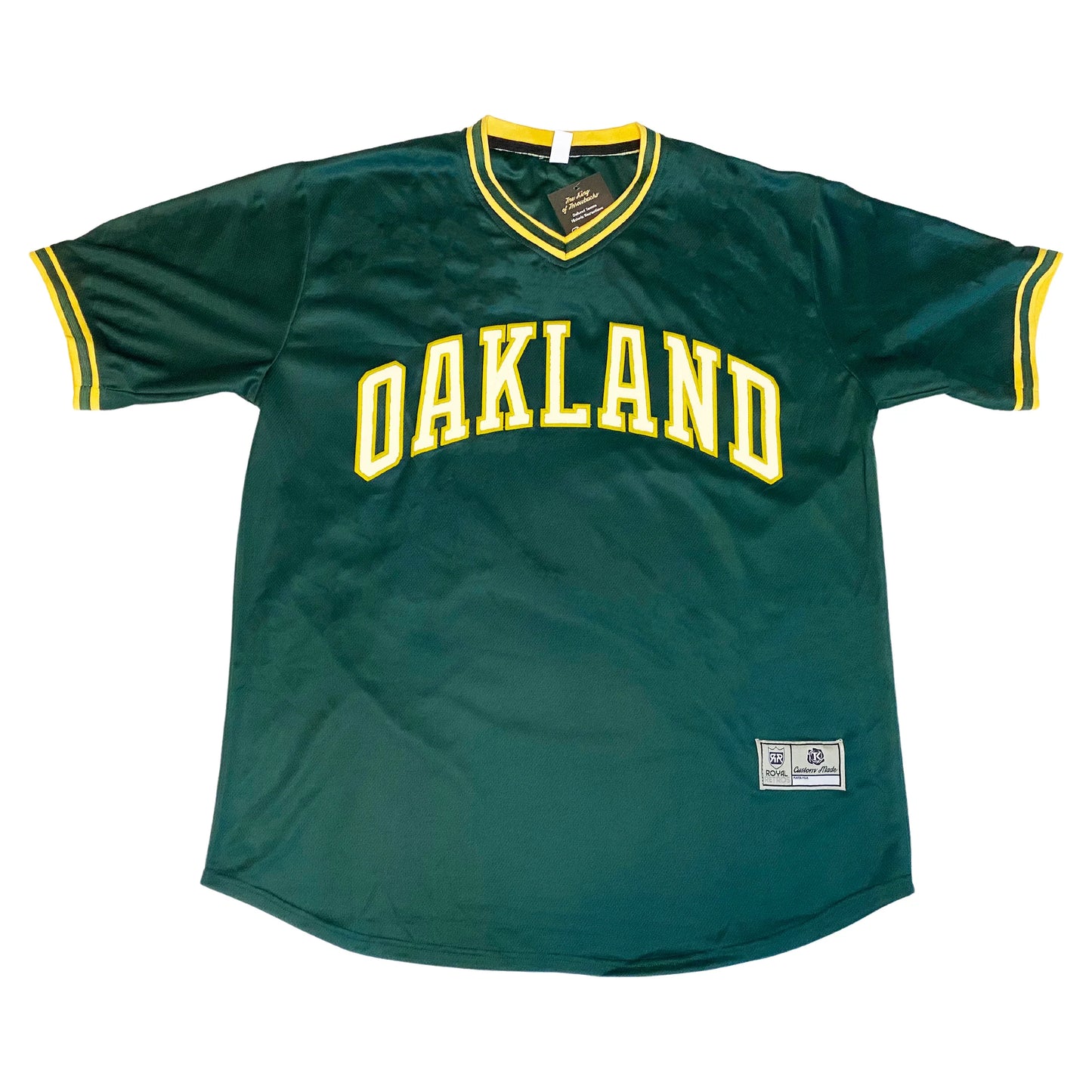 Oakland A's baseball jersey green with yellow and green trim on neck and sleeves Oakland in white with yellow trim across chest. Royal Retros