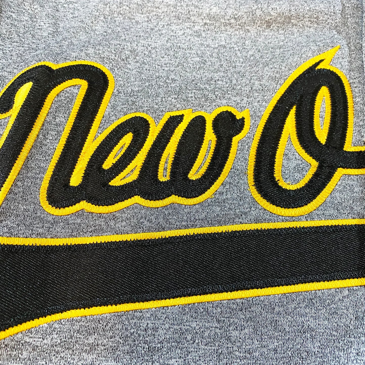 Embroidered New Or text on a heavyweight sewn tackle twill Orleans Baseball Pelicans jersey