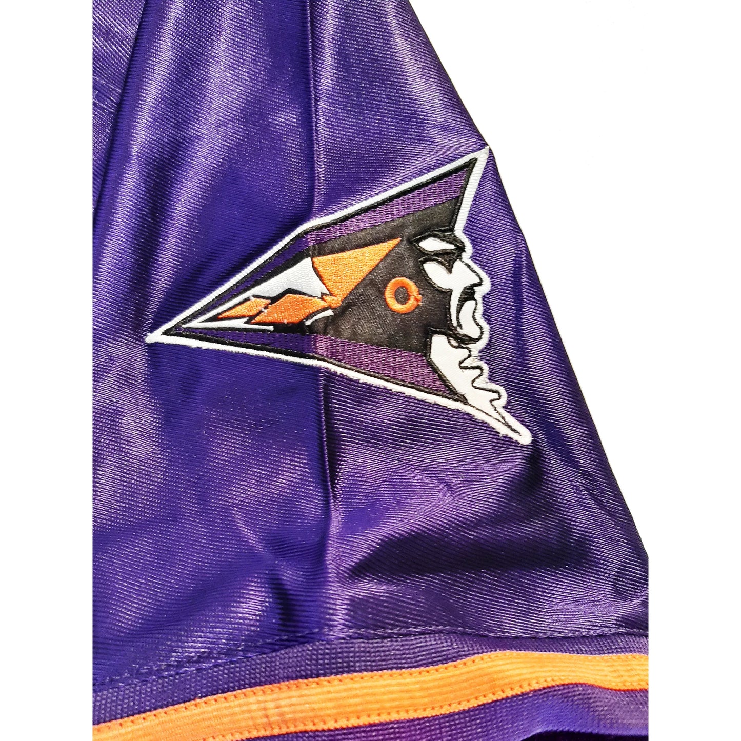 Shreveport Pirates Jersey purple close-up logo on sleeve. Stylized pirate face looking right. Royal Retros
