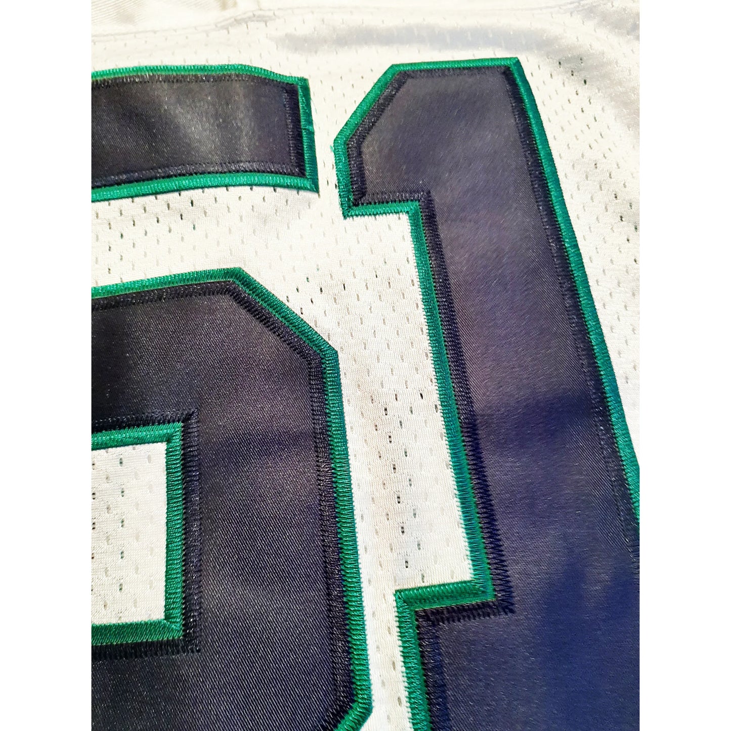 Hamburg Sea Devils WLAF Jersey white close-up #51 Blue with teal trim. Royal Retros