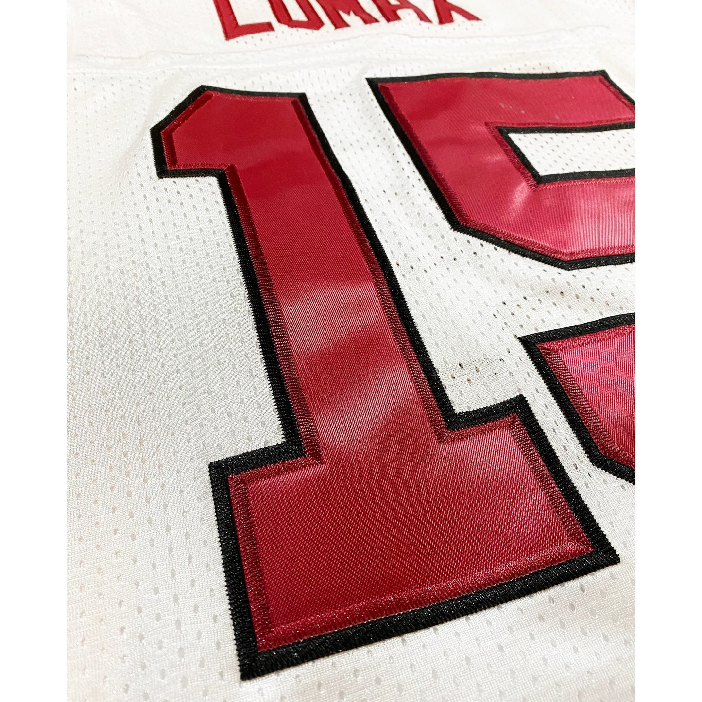 St. Louis Cardinals jersey white. #15 in red with black trim, Lomax in red above numerals. Royal Retros