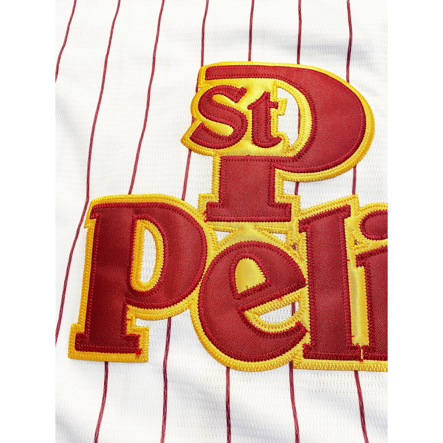 Embroidered lettering on a St Petersburg Pelicans Jersey with free customization included