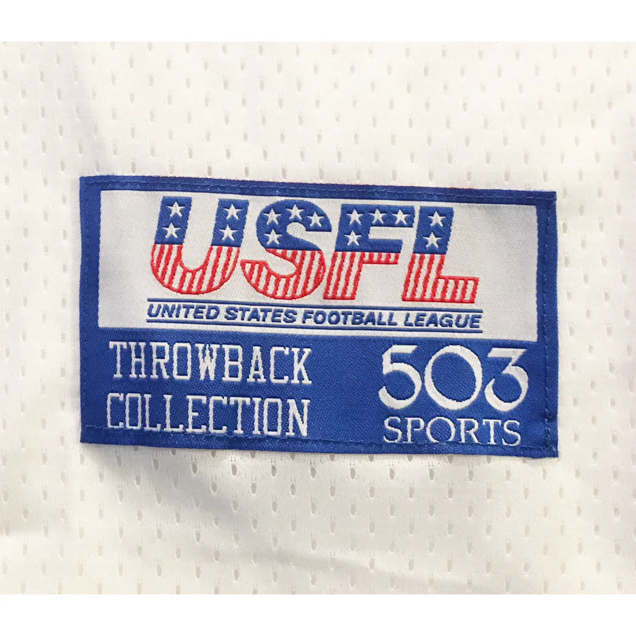 Orlando Renegades USFL Jersey white close-up of USL/503 Sports tag Royal Retros