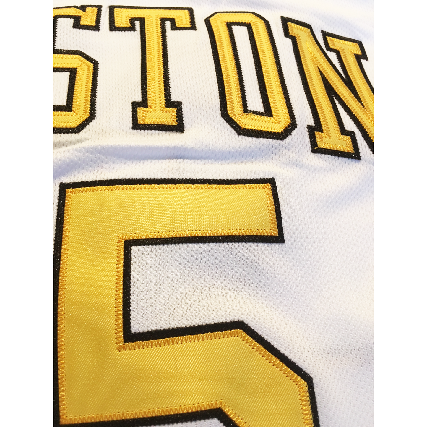 White Houston Mavericks jersey featuring gold and black lettering from Royal Retros