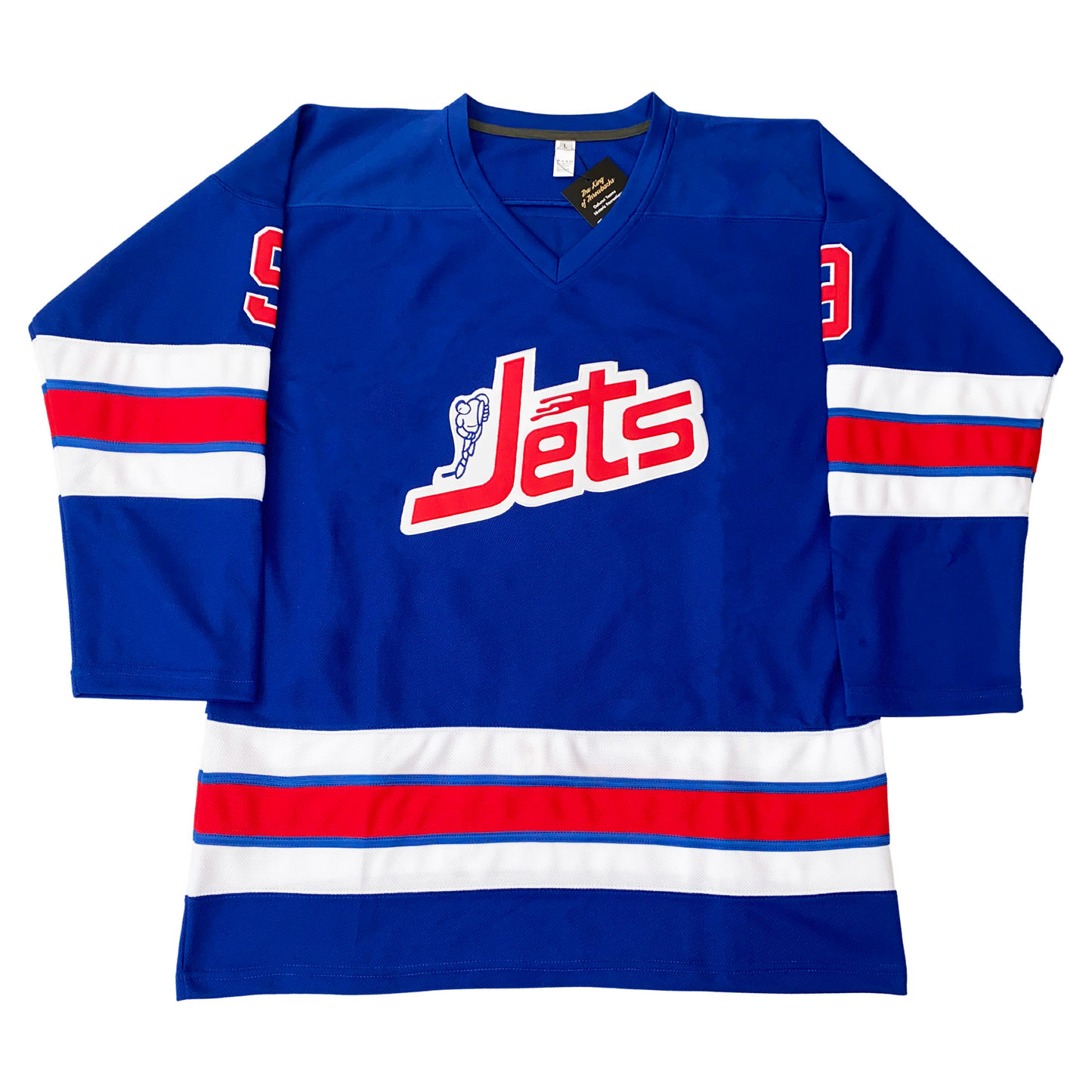 WHA Jets Jersey blue. Jets with white shadow across chest, skater in blue to left of "J" White, red, white bands with blue trim separating red and white, mid-sleeve and above waist. Royal Retros