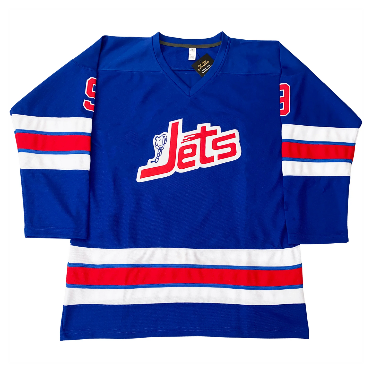 WHA Jets Jersey blue. Jets with white shadow across chest, skater in blue to left of "J" White, red, white bands with blue trim separating red and white, mid-sleeve and above waist. Royal Retros