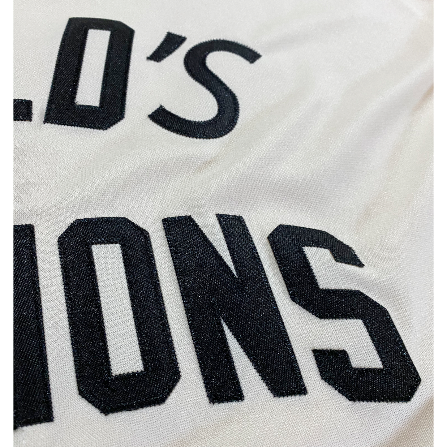 Embroidered white fabric of the World’s Champions Jersey, individually handmade inspired by early 1900’s