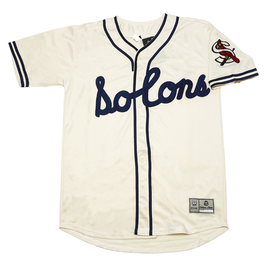 1940 Sacramento Solons button-up jersey. Two blue stripes at sleeve ends, around neck and down front. Solons script across chest. Solons S logo on left sleeve. Royal Retros.