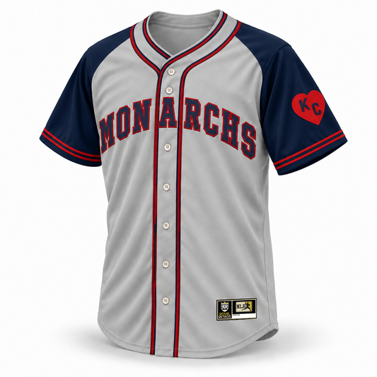 1942 Kansas City Monarchs NLB jersey gray front mockup, navy raglan sleeves, navy lettering with red outline, KC heart patch and original NLB jock tag