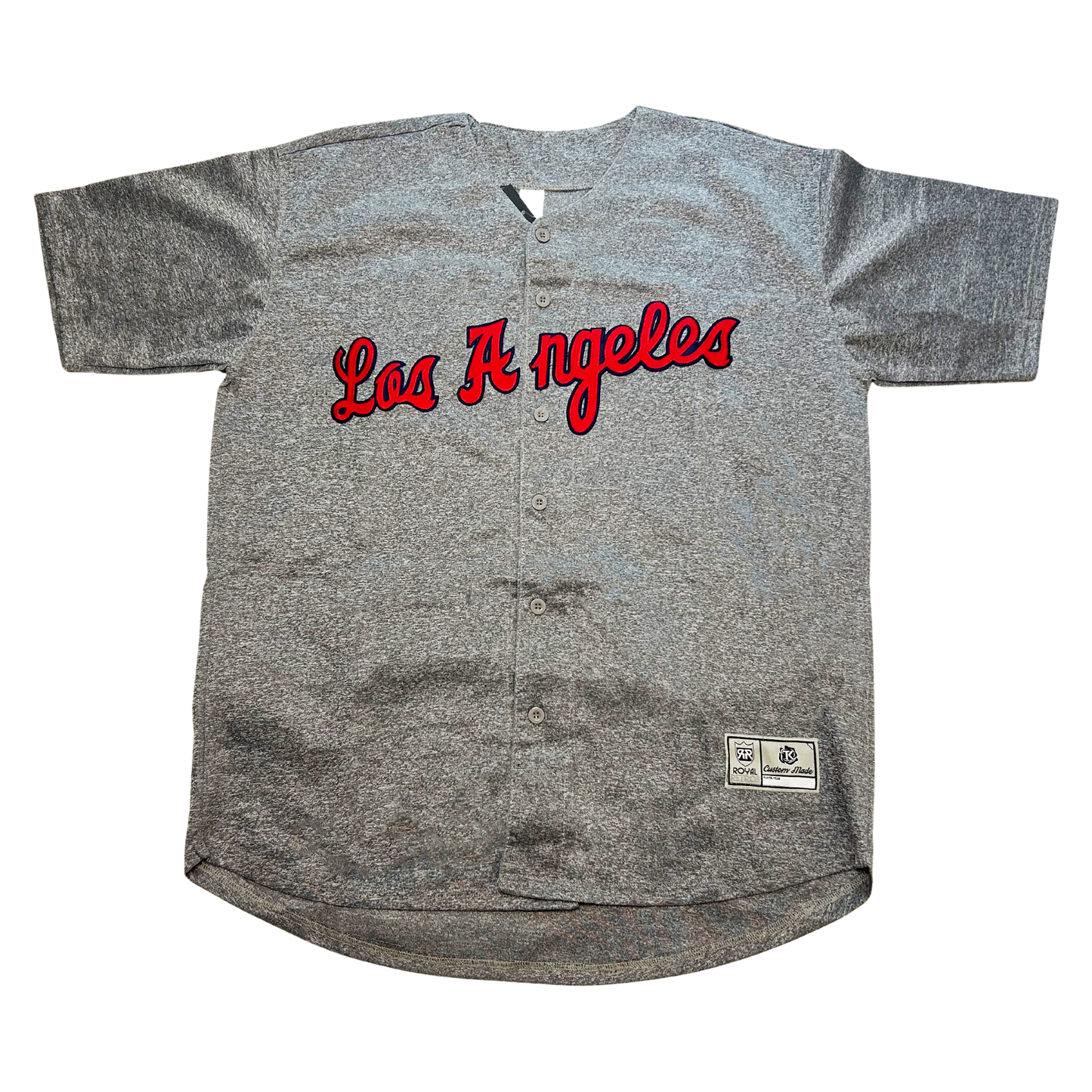 1957 Los Angeles Angels jersey. Pepper gray. Los Angeles in script across chest with blue trim. Royal Retros