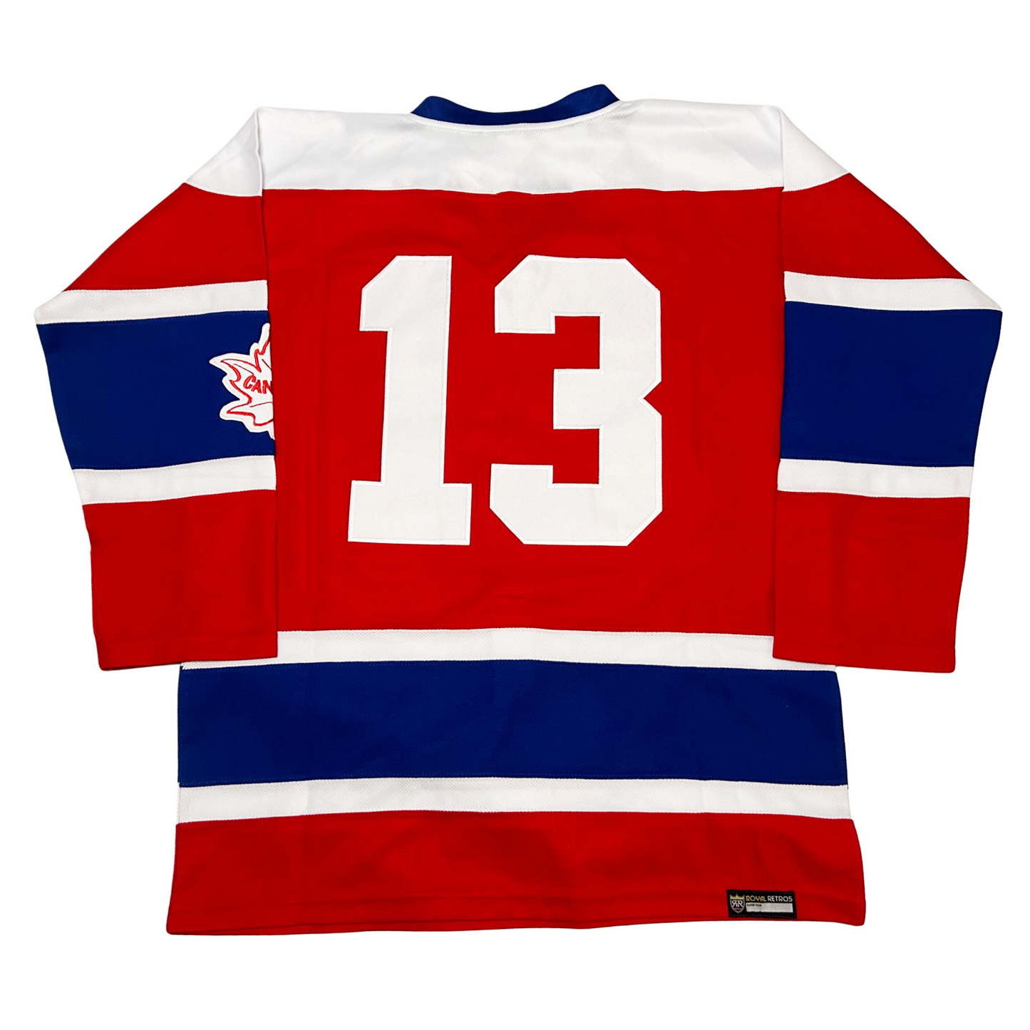 1964 Canada Hockey jersey. Red. Back. Blue collar, white shoulders. Small red, large blue, small white bands mid-sleeve and just above waist. Large #13 in white large on back. Small white maple leaf with red detail and "Canada" in middle. Royal Retros