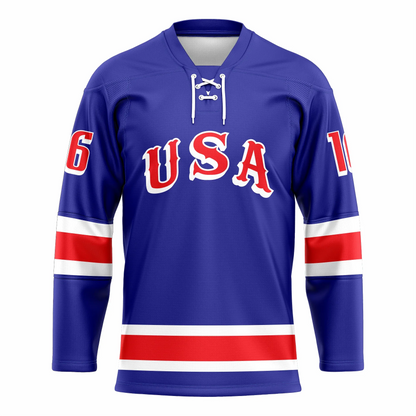 1968 USA hockey jersey. Blue. Red collar. White, red, and white bands mis sleeve. USA in wild west typeface, red with blue and white trim. White, red, and white band just above waist. Royal Retros