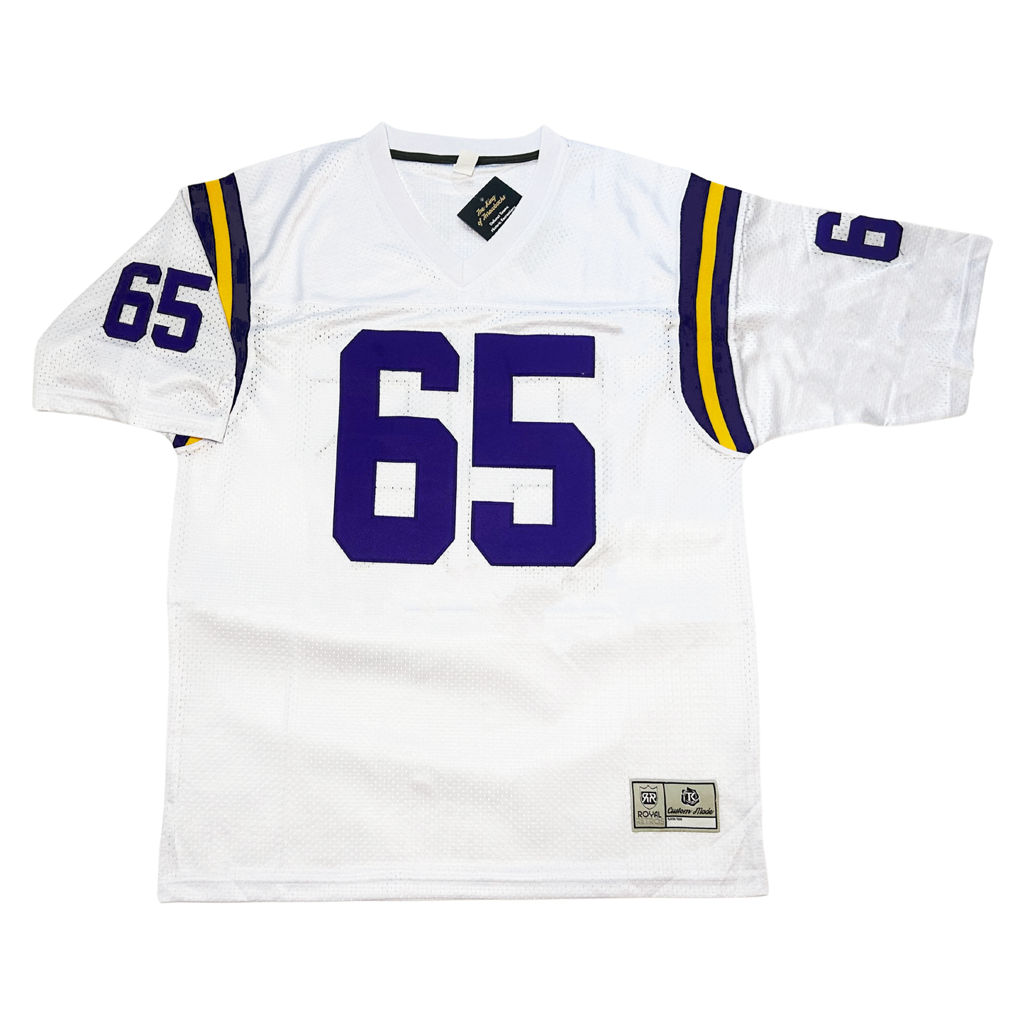 1976 Minnesota Vikings jersey white front. Purple gold and purple stripes at top of sleeves. Purple #65 large on chest, small on both sleeves. Royal Retros