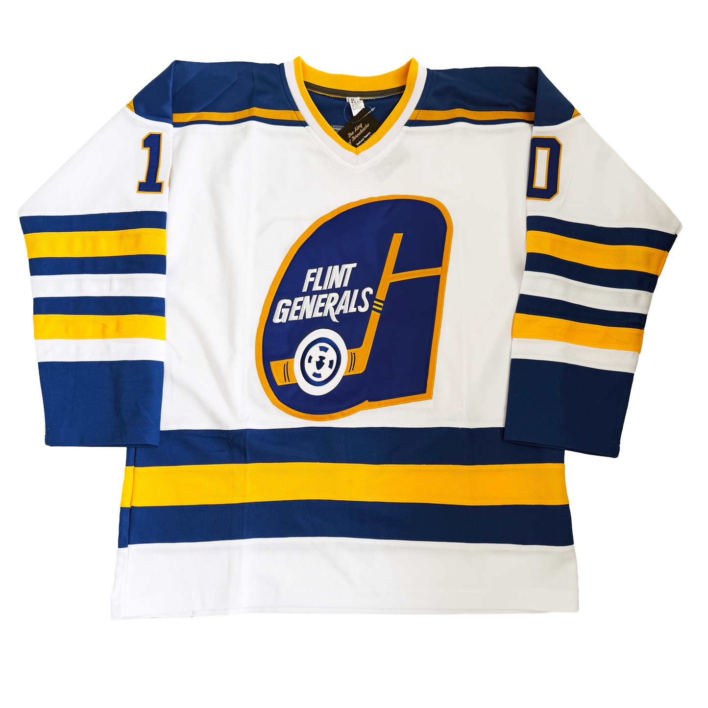 Flint Generals hockey jersey in white with navy blue shoulders, gold and navy stripes on the sleeves and hem, and the teardrop G crest with FLINT GENERALS lettering at center chest