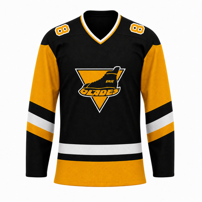 Erie Blades hockey jersey in black with gold sleeves and shoulder yokes, black and white striping, and the gold inverted-triangle crest with ERIE above the Blades script at center chest