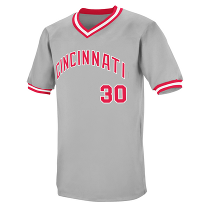 1990 Cincinnati Reds wire -to-wire baseball jersey. Gray. CINCINNATI in red block with white trim arched across chest. #30 red with white trim below right. Red, white, and red trim at sleeve ends and around neck. Royal Retros
