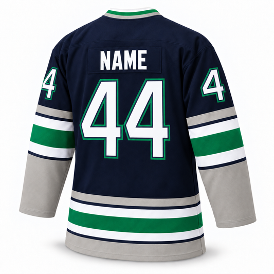 1990s Hartford Whalers navy hockey jersey, back view, solid white NAME and white number 44 with navy keyline and green outline.