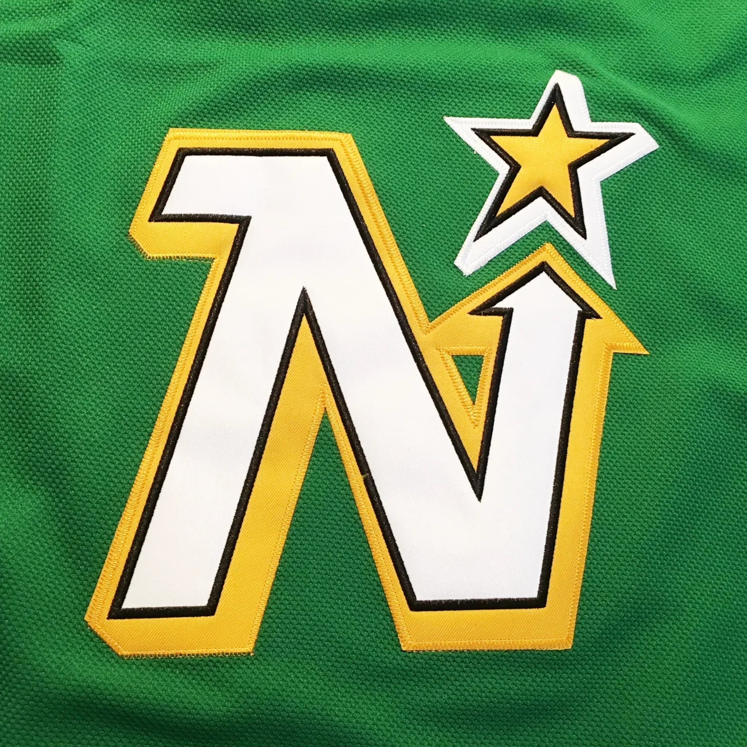 1990s Minnesota North Stars N-star crest close-up — Royal Retros