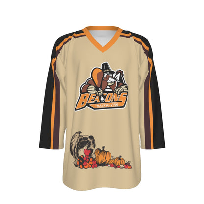 Port Huron Beacons Thanksgiving Replica Jersey. Tan with black sleeves and orange and brown stripes. Beacons crest wearing a pilgrim hat on the chest and a cornucopia of pumpkins and fall harvest at the hem.