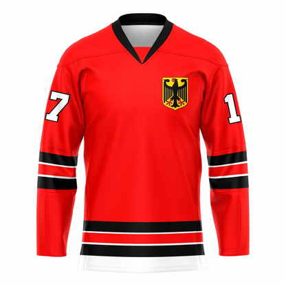 Germany Hockey Jersey. Red with black collar. Black band, red band, black band, with gold in between, mid-sleeve and around west. Gold shield with stylized black eagle upper left chest. Royal Retros