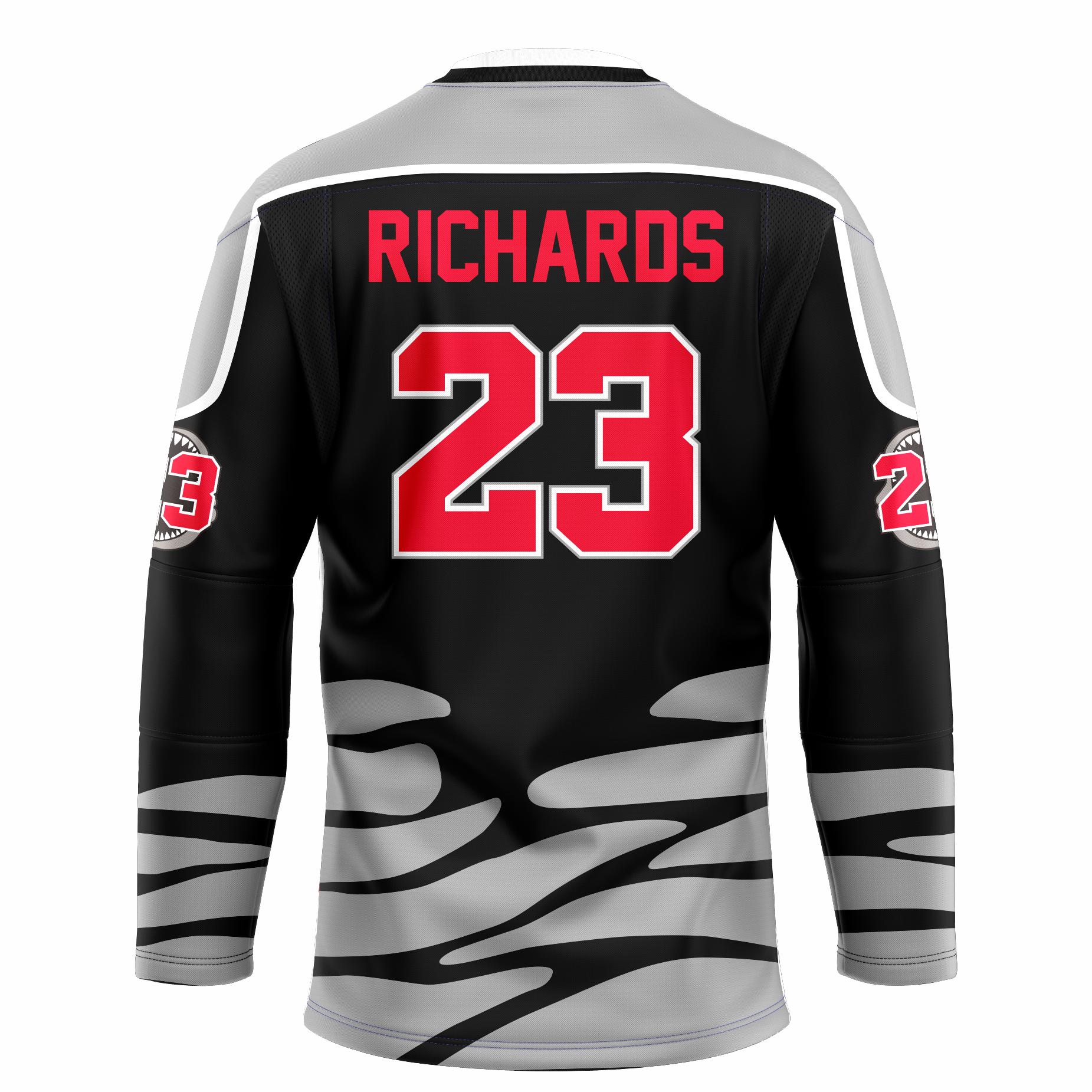 Tallahassee Tiger Sharks hockey jersey. Black. Black and white collar, silver shoulders with white trim. Random silver patter at sleeve ends and around waist suggesting ocean waves. RICHARDS in red above #23 in red with white trim large on back. Royal Retros