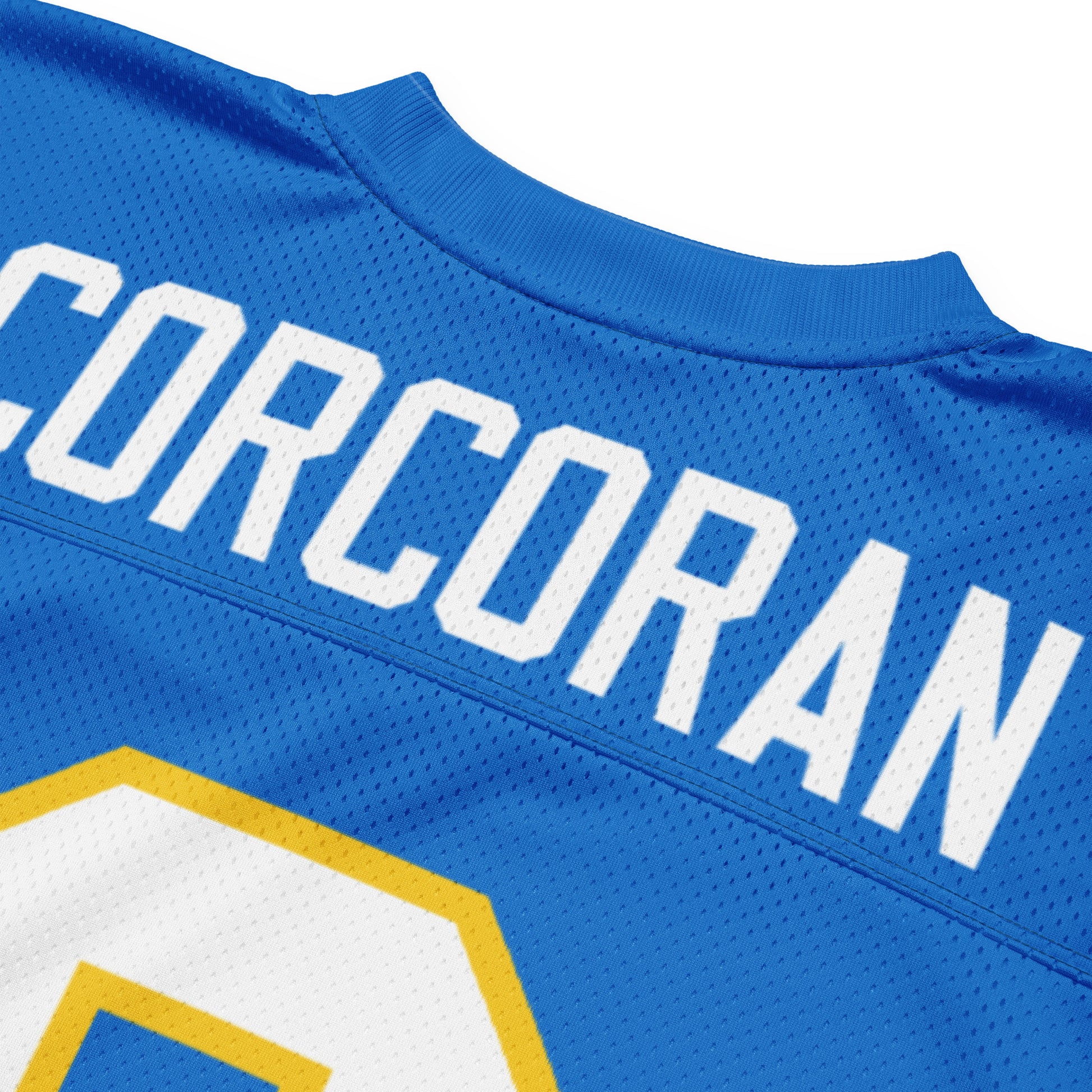 Philadelphia Bell King Corcoran jersey. Blue.  Back. Close-up of Corcoran in white across top, large 9 in white with gold trim. 9 on each sleeve, white with gold trim. Gold, white, and gold  bands just above sleeve ends. Royal Retros