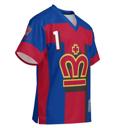 London Monarchs short sleeve football jersey, all-over print. Royal blue. Red cross pattern large. #1 upper left in white. M in the shape of a crown, red with gold trim, cross above red with gold trim, bar below red with gold trim. Red downsides and up through sleeves. Red sleeve ends. Royal Retros